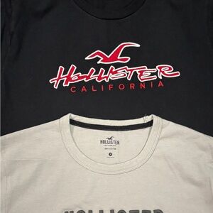 2 Hollister shirts. Black and Light Gray Tees